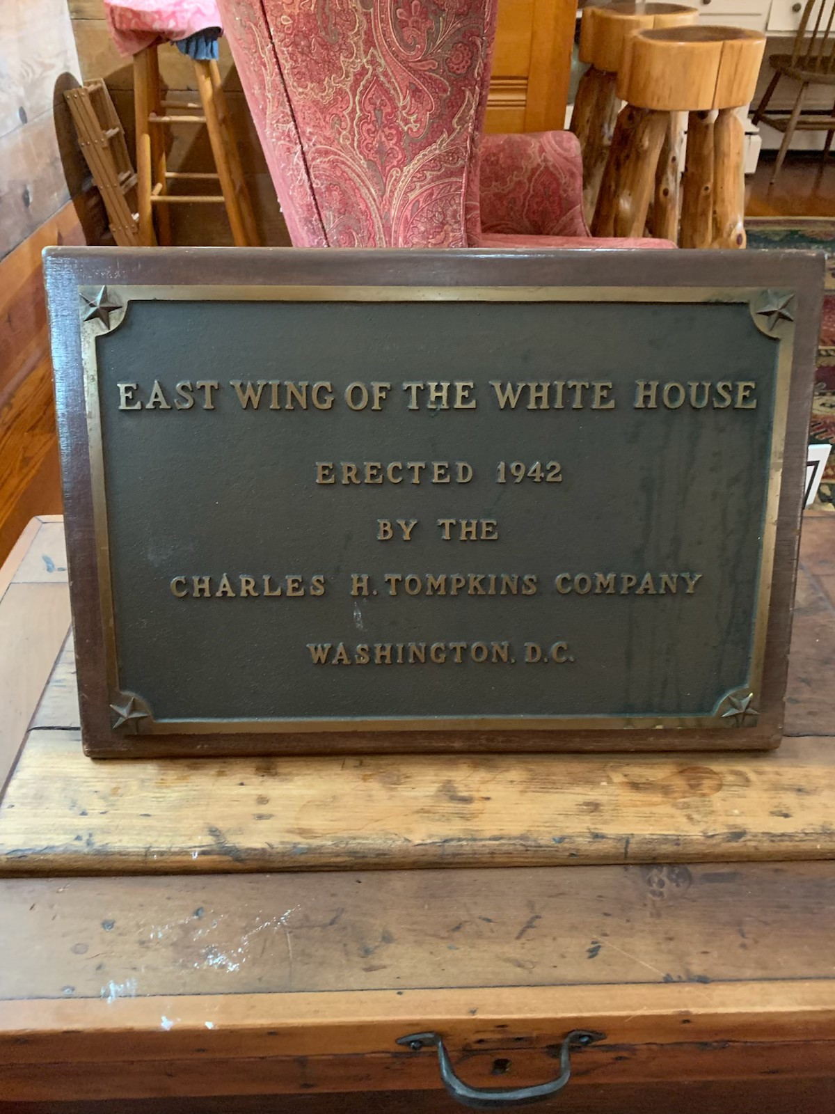Bronze plaque: East Wing of the White House, erected 1942 by the Charles H. Tompkins Company, Washington, D.C.